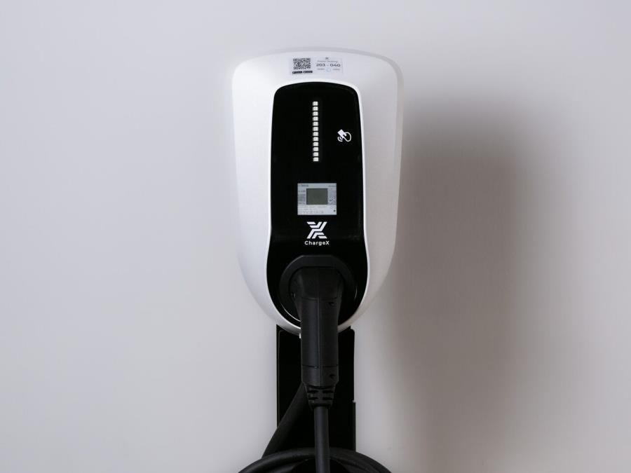 As single Aqueduct charging station in black and white.