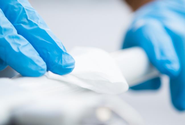 Disinfectant wipes being used in a medical setting