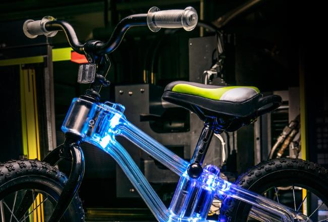 The first Phantom bike frame combines the strength and transparency of Makrolon® with LED lights.