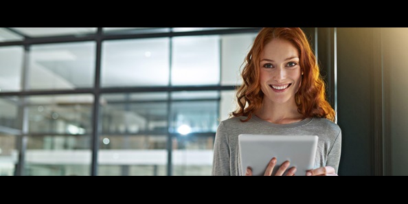woman holding a tablet