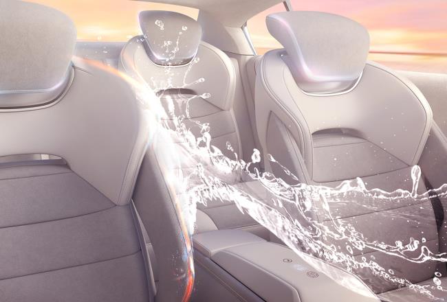 A futuristic car where a splash of water is rushing through.