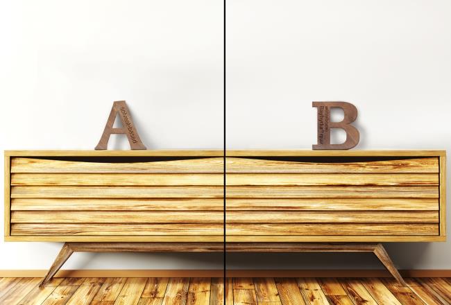 A sideboard shelf made of wood with two wooden letters on its top.