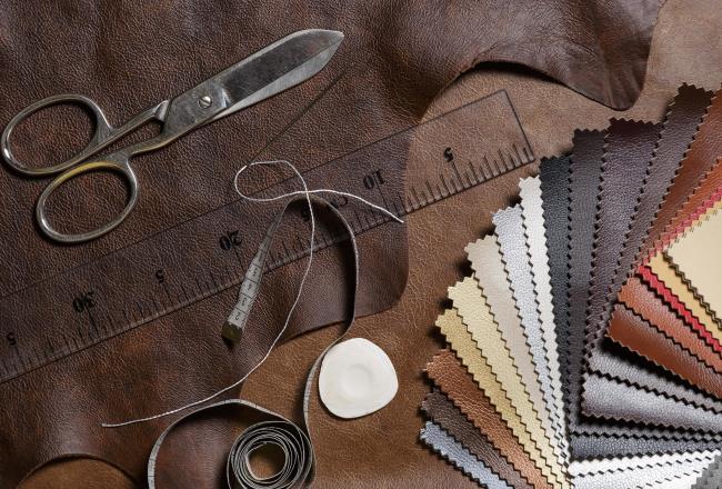 Samples of TPU synthetic leather, fanned out to show a range of colors and textures.
