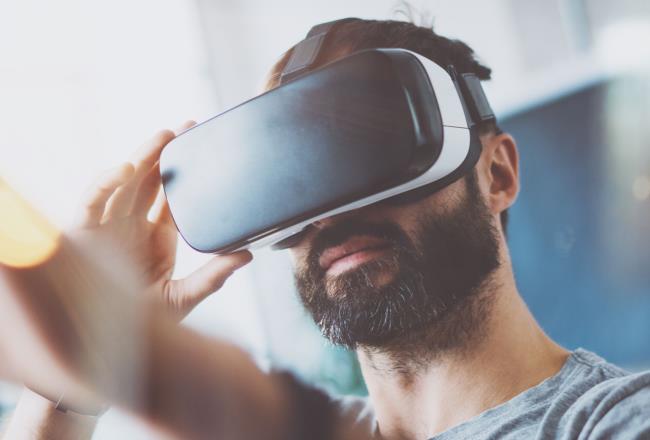 Man wearing virtual reality goggles