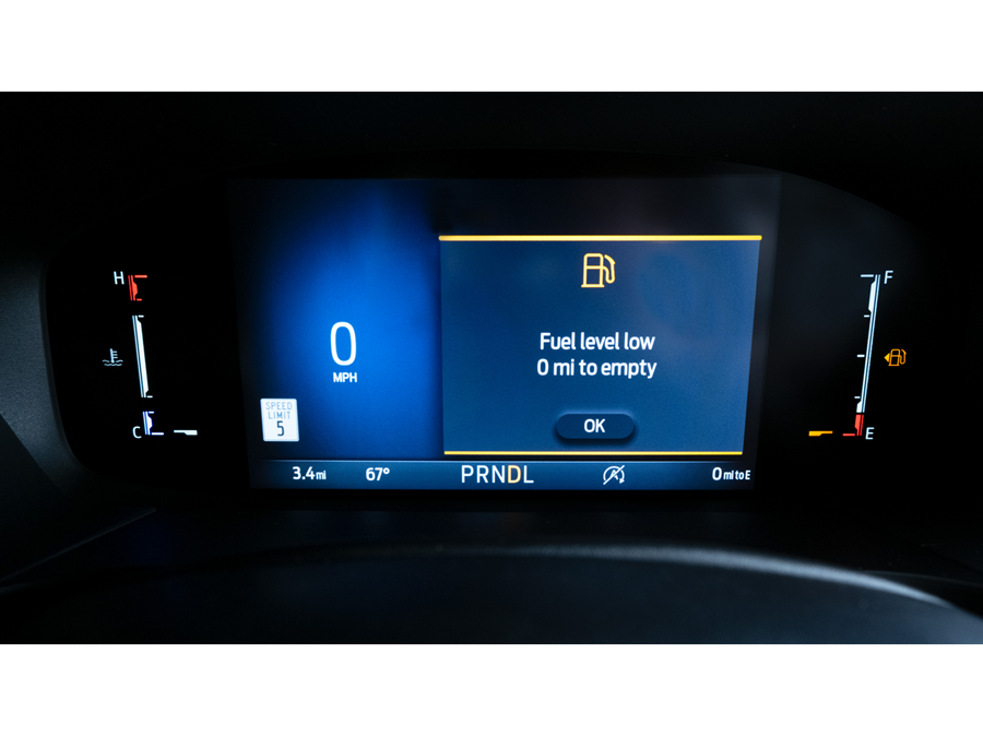 Illuminated display indicating that fuel level is low