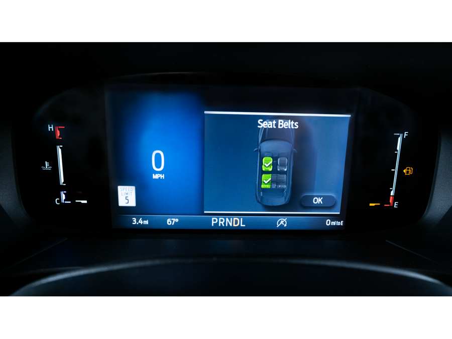 Illuminated display indicates fastened seatbelt