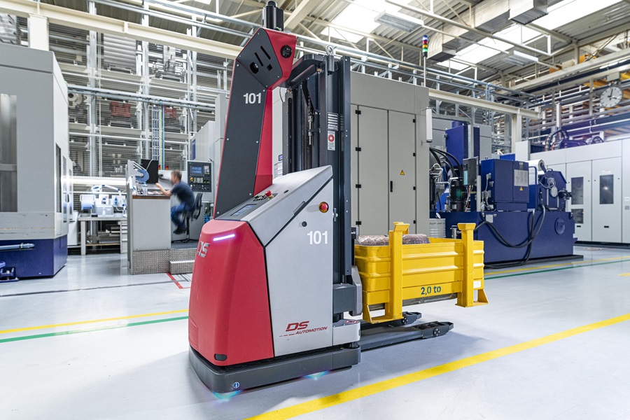 Automated guided vehicle (AGV) forklift with Vulkollan® wheels in production facility.