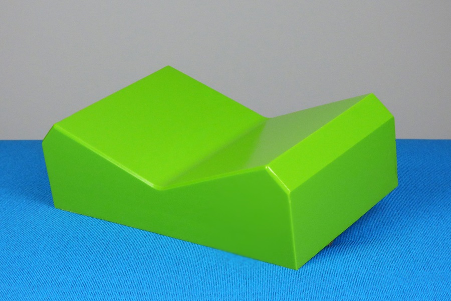 Tensioner track pad containing CO2 technology- based material
